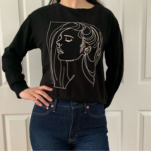 Printed long sleeve. Woman face.